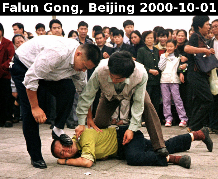 Police steps over Falun Gong believer s face in 2000 at Tiananmen